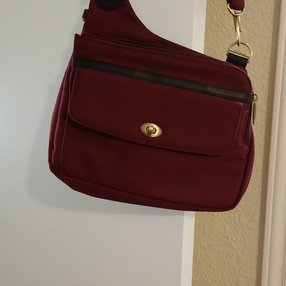 Travelon asymmetric Anti--Theft crossbody bag.